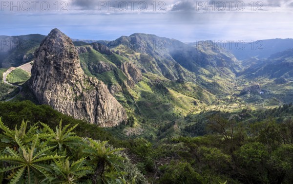 View of the Roque de Agando rock tower and the Barranco de Benchijigua gorge from the Mirador del