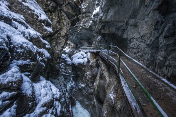 Winter, snowy landscape, river Breitach and hiking trail through the Breitachklamm gorge near