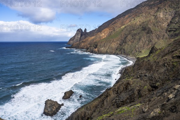 The north-west coast of La Gomera with the Playa de Arguamul beach. Mountains, cliffs and steep