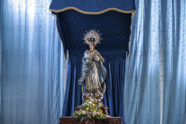 Statue of the Virgin Mary in the interior of the church of Santa María de la Concepción in