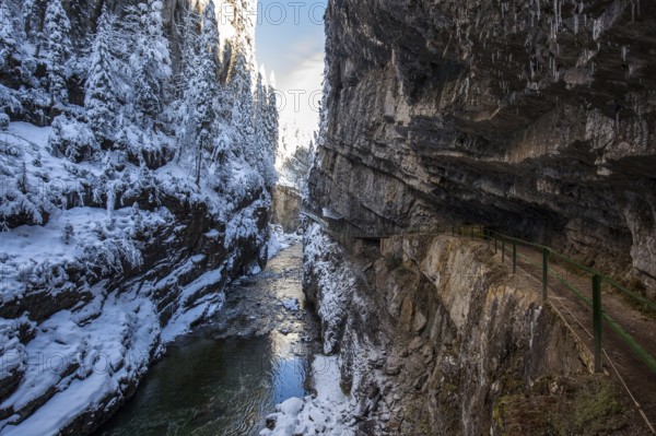 Winter, snowy landscape, river Breitach and hiking trail through the Breitachklamm gorge near