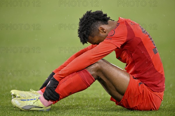 Kingsley Coman FC Bayern Munich FCB (11) injured Injury on the ground disappointed Allianz Arena,