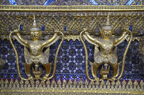 Golden sculptures of Garuda and Naga, Wat Phra Kaew, Temple of the Emerald Buddha, Bangkok,