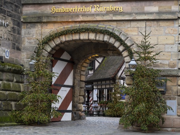 Christmas trees with fairy lights at the Königstor, Handwerkerhof, Nuremberg, Middle Franconia,