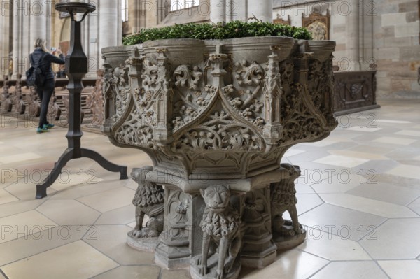 Romanesque baptismal font in the late Gothic hall church of St George, Dinkelsbühl, Bavaria,