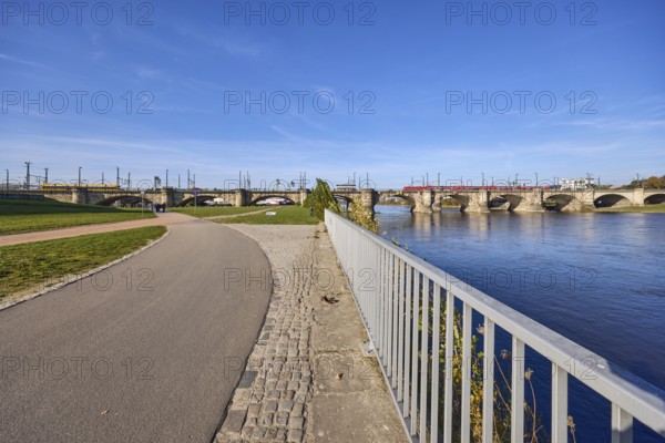 Marienbrücke, river Elbe, Elbe riverbank, footpath and cycle path, metal railing, meadow, blue sky