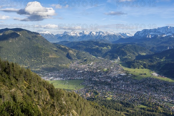 View of Garmisch-Partenkirchen and mountain panorama, hike to Kramerspitz, in autumn, Ammergau