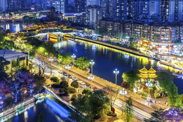 Chengdu skyline with Anshun Bridge over Jin River at night in Chengdu, China, Asia
