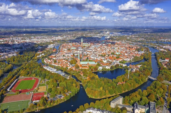 Aerial view over the river Trave and church towers in the old town of the Hanseatic City of Lübeck
