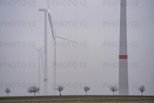 Wind farm in fog, dark doldrums, no wind no direct sunlight, in the Rhenish lignite mining area,