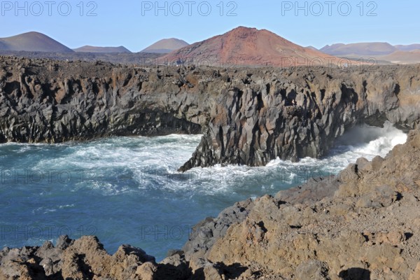 Rugged rocky coastline created by prehistoric volcanic activity Volcanism in early history Bay of