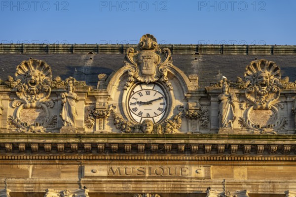 Clock and details of the theatre of Calais, France, Europe