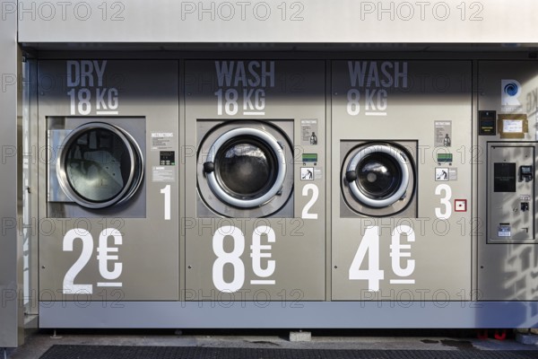 Public laundry, washing machines, tumble dryers, outdoor launderette, self-service, Ring of Kerry,