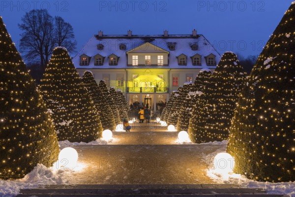 Wackerbarths Winterzauber, Wackerbarth Castle with Christmas lights and snow, Radebeul, Saxony,