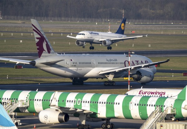 Düsseldorf Airport, Qatar Airways Boeing 787 Dreamliner, Eurowings aircraft on the apron, taxiway,
