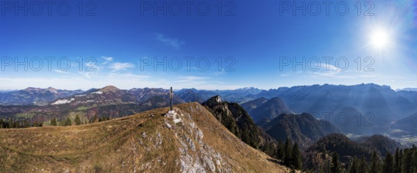 Drone shot, summit cross on the Schwarzer Berg with a view of the Lammertal with Dachstein massif