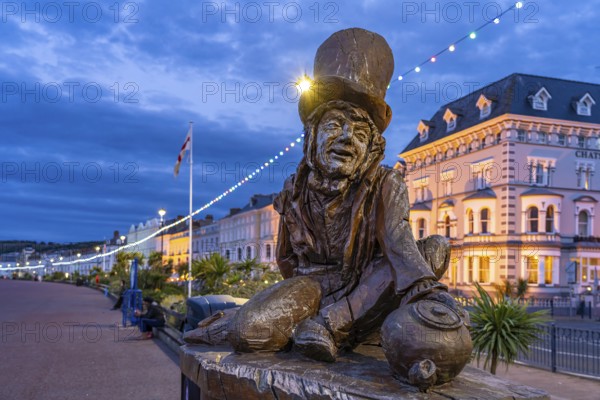Sculpture of the Mad Hatter or The Mad Hatter from Alice in Wonderland on the promenade of the