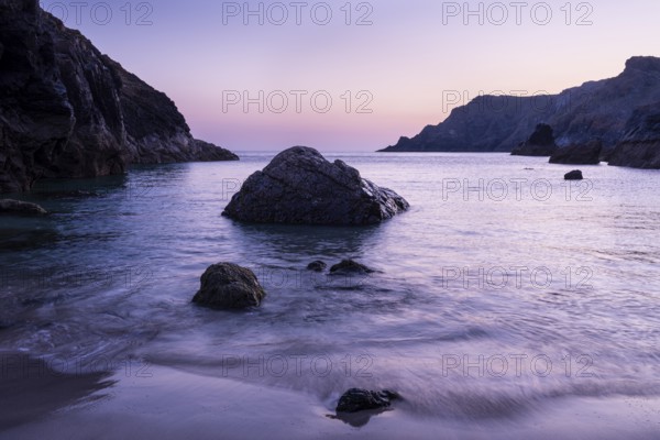 Coast and rocks in Kynance Cove. Evening, blue hour. Kynance Cove, Lizard Peninsula, Cornwall,