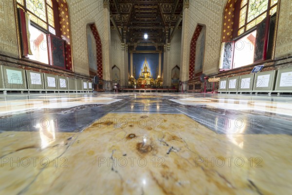 Golden Buddha statue, Bhumispara-mudra, Buddha Gautama at the moment of enlightenment, in the