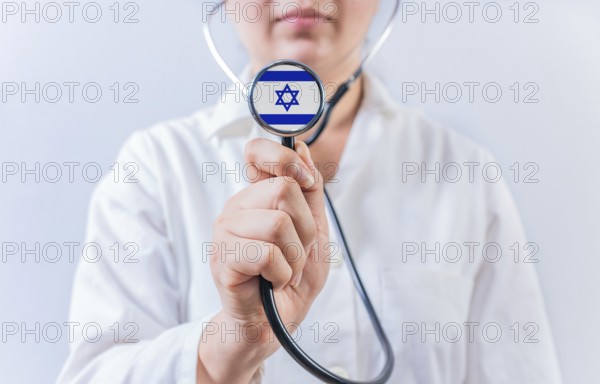 Doctor showing stethoscope with Israel flag. Israel National Healthcare concept