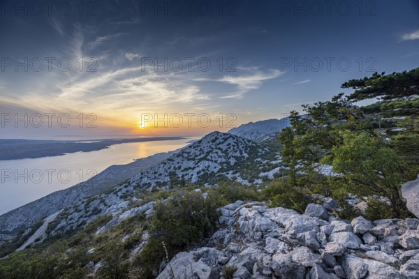 View of the sea and mountains at sunset, Pag, Zadar, Croatia, Europe