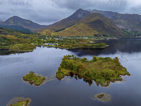 Mountains reflected in fjord, coast, island, autumn, cloudy, aerial view, Loch Leven, view of