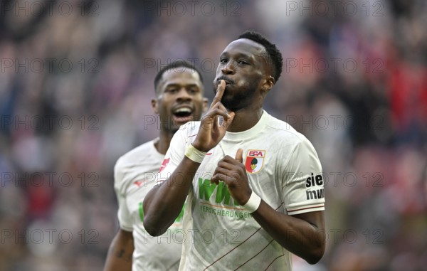 Goal celebration Chrislain Matsima FC Augsburg FCA (05) Gesture Gesture Finger on mouth WWK Arena,
