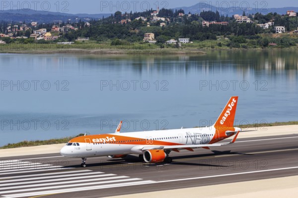 An EasyJet Airbus A321neo aircraft with the registration G-UZMA at Corfu Airport, Greece, Europe