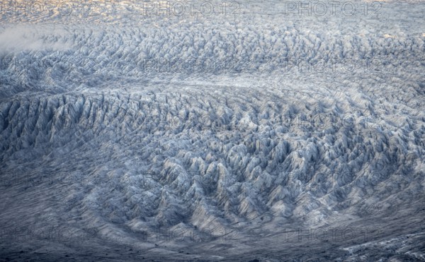 Structure of the glacier ice of Myrdalsjökull glacier in the evening light, Pakgil, Iceland, Europe