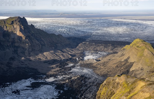 Impressive landscape with mountains and glaciers in the evening light, glacier tongues Huldujökull