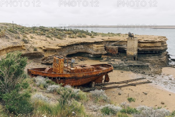Abandoned supply boat, abandoned Swift factory, The Swift refrigerator in Puerto San Julián, Puerto