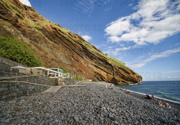 On the beach of Garajau, Ponta do Garajau stone beach, bathing beach, cliffs, Garajau, municipality
