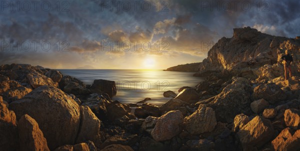 Sunset over the rocky coast of Finiki fishing village with dramatic sky, Finiki fishing village,