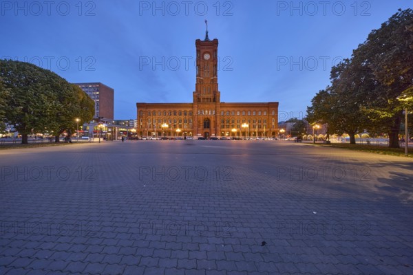 Red Town Hall with trees and square at dusk, Rathausstraße, Berlin, capital city, independent city,