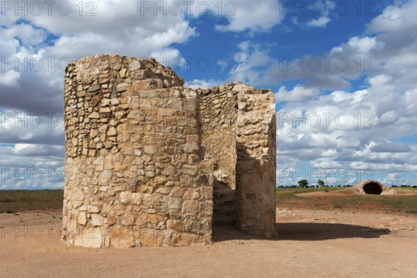 An old wall-like ruin of stones under a cloudy sky, Molino Castaño, Castaño Mill, Campo de