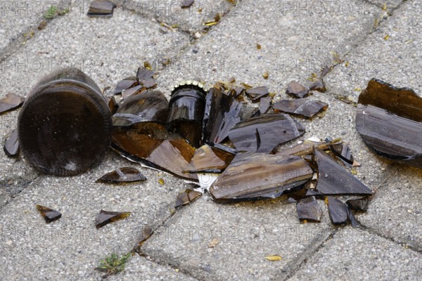 Broken bottle, broken glass, danger to passers-by and cyclists, Saxony, Germany, Europe