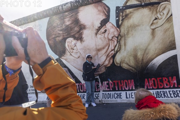 East Side Gallery. Remnant of the Berlin Wall, designed by artists. Landmark and city view Berlin,