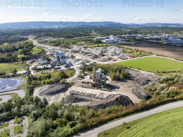 Aerial view of a gravel pit, gravel extraction area, gravel works, asphalt mixing plant and