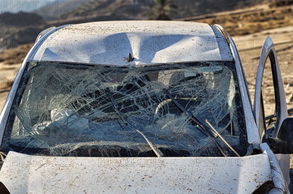 Car, shattered windscreen, total loss after flood, flood damage after flood disaster in Almeria,