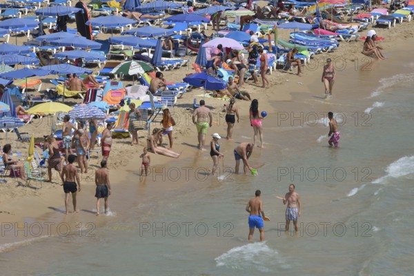 Bathers on Playa Levante, Benidorm, Costa Blanca, Spain beach