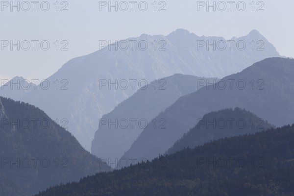 Alps in Chiemgau, tiered mountains, blue silhouettes, Chiemgau, Bavaria Germany