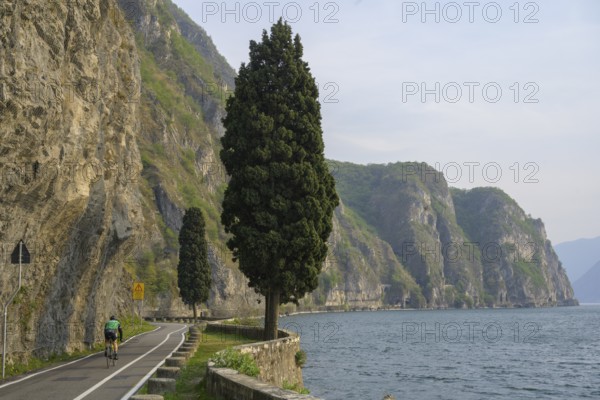 Beautiful cycle path along the eastern shore of Lake Iseo, Pisogne, Province of Brescia, Italy,