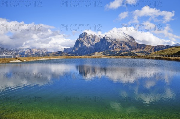 Snow-covered Plattkofel and Langkofel, lake with fish, reflection, Dolomites, Seiser Alm, snow,