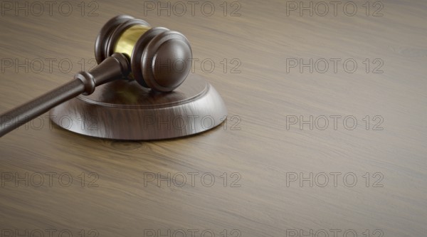 Gavel resting on a table with room for text