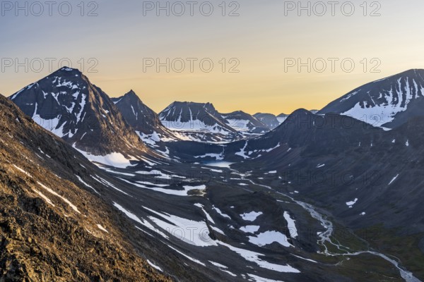 View into the valley Unna Räitavagge, also Unna Reaiddavaggi, during midnight sun, mountain