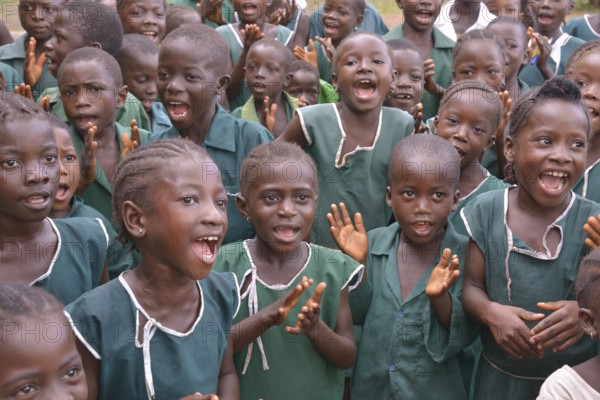 School children singing, near Bo, Bo District, Sierra Leone, Africa
