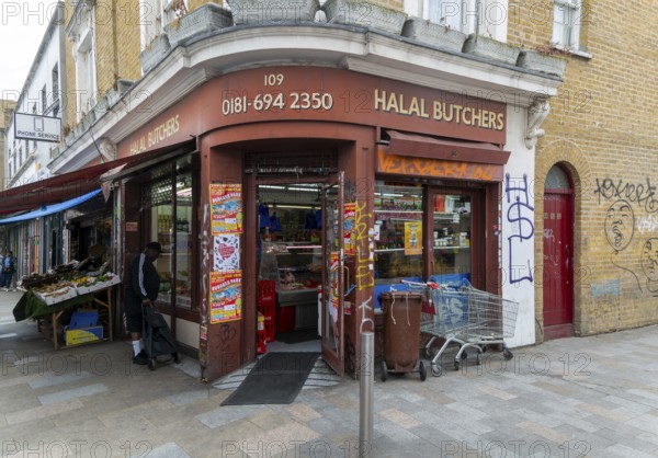 Halal butchers corner shop, Deptford High Street, London S8, England, UK