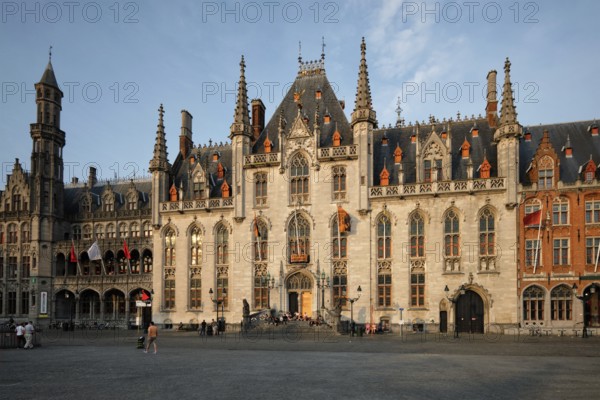 BRUGES, BELGIUM, MAY 28, 2018: Famous tourist destination Grote markt square and Provincial Court
