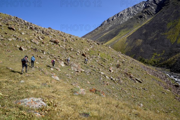 Hikers in the West Karakol Valley, Tien Shan Mountains, Naryn region, Kyrgyzstan, Asia