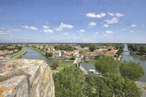 View of Canal du Rhone a Sete, canal with swing bridge, Aigues-Mortes, Gard, Camargue, Provence,